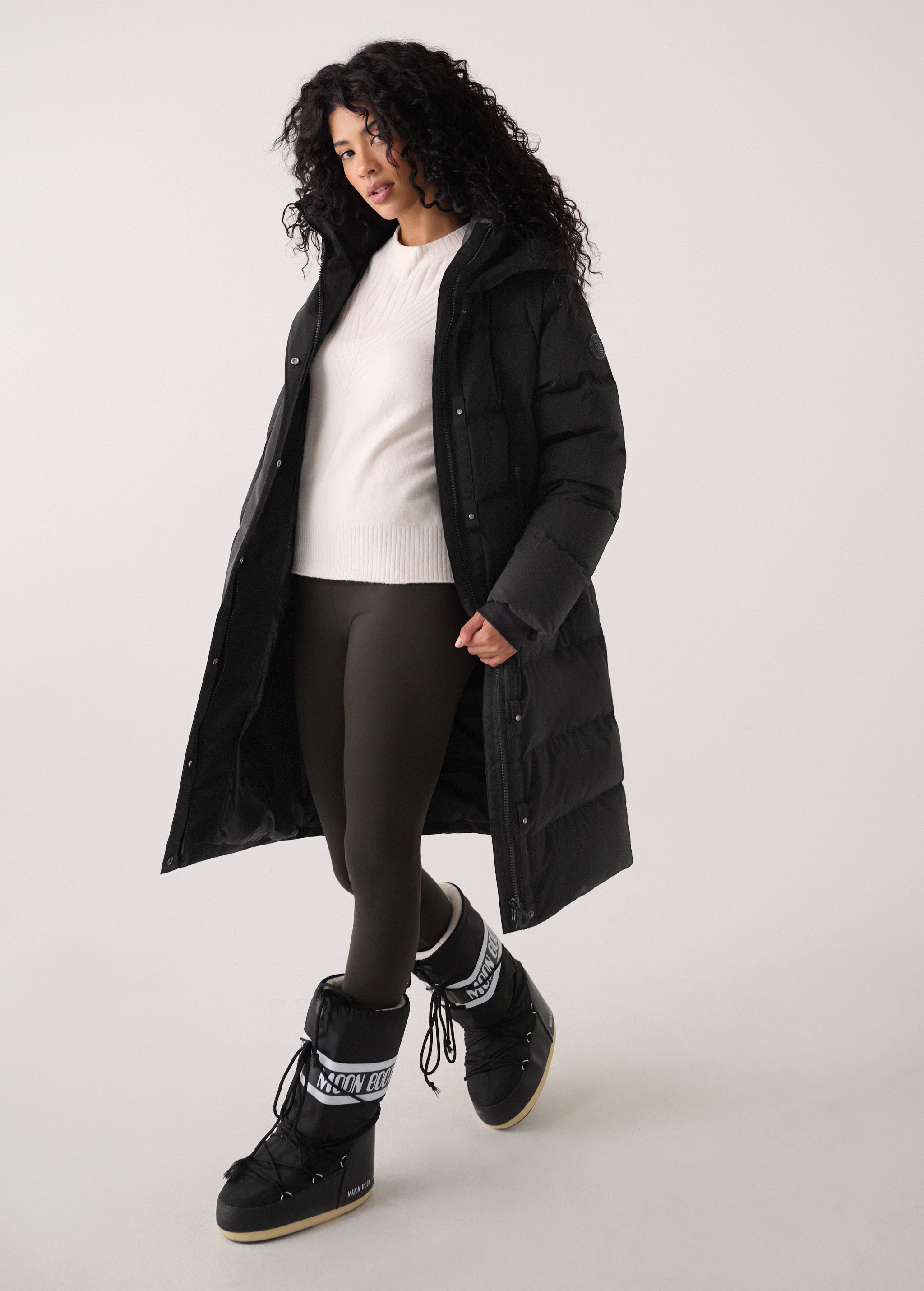 Lolë Après Down Winter Jacket in black — achieve full-body warmth with this longline city jacket