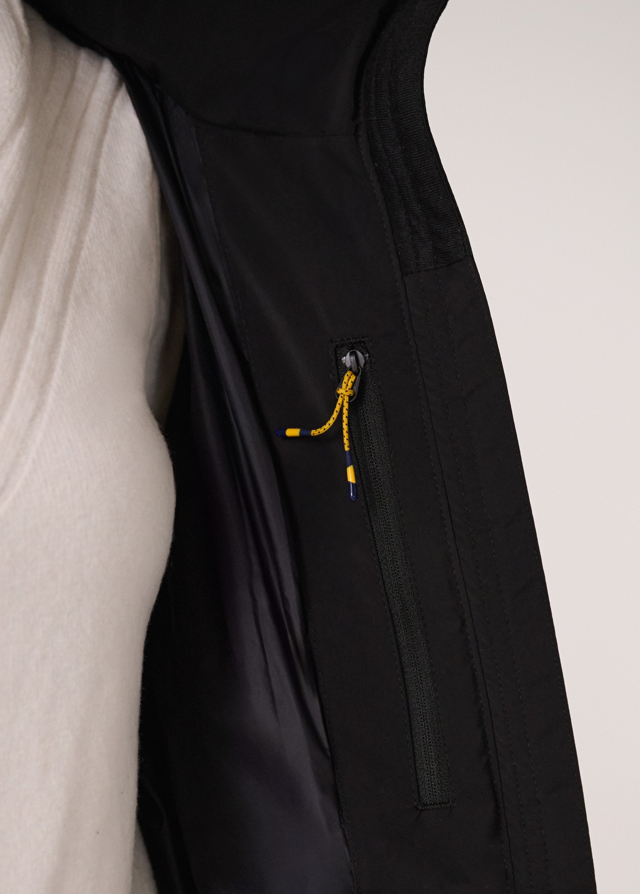 Lolë Après Down Winter Jacket in black — achieve full-body warmth with this longline city jacket