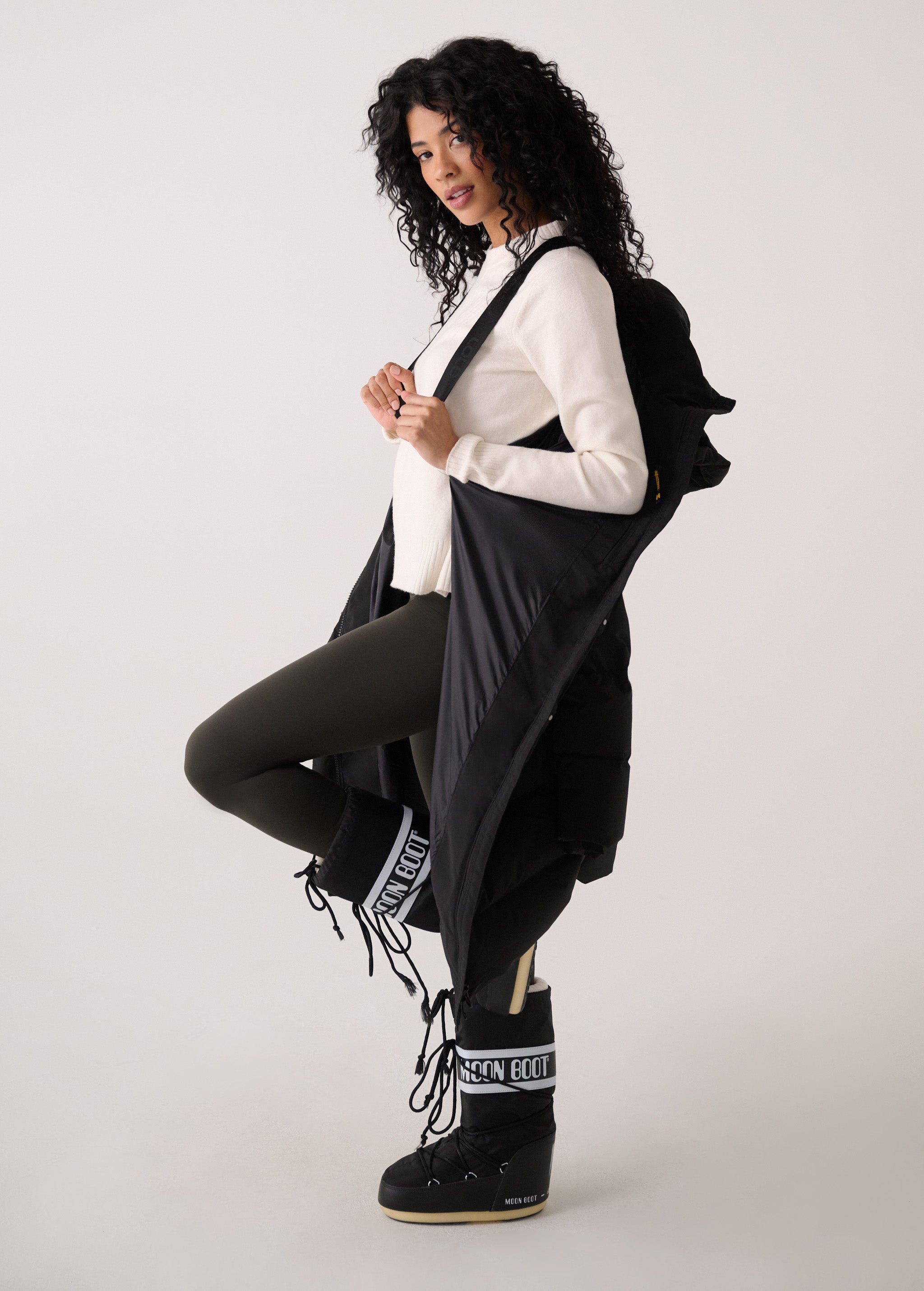 Lolë Après Down Winter Jacket in black — achieve full-body warmth with this longline city jacket