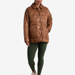 Lolë The Shacket Insulated Jacket in black — part shirt, part jacket, the Shacket is made for transitional days