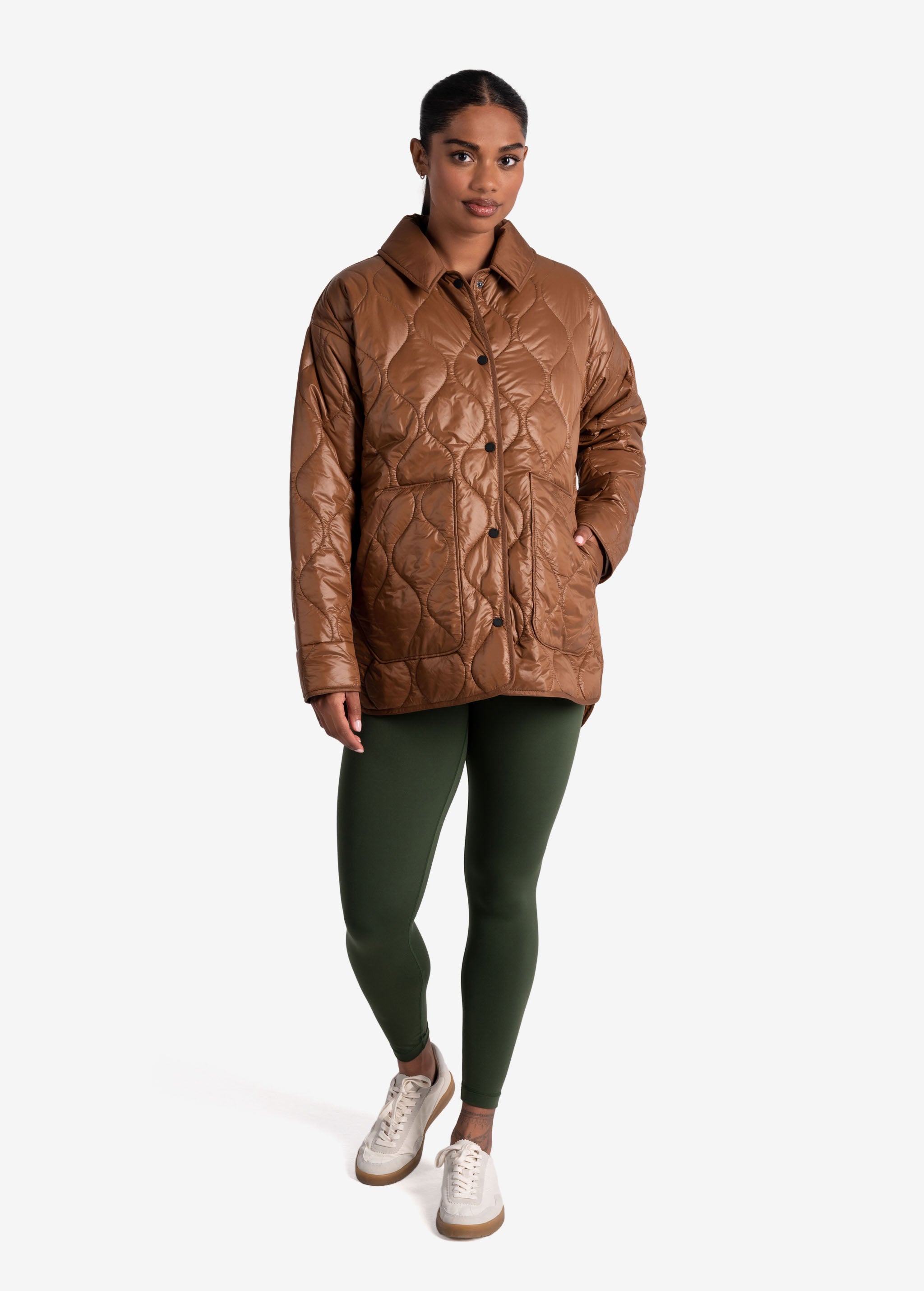 Lolë The Shacket Insulated Jacket in black — part shirt, part jacket, the Shacket is made for transitional days