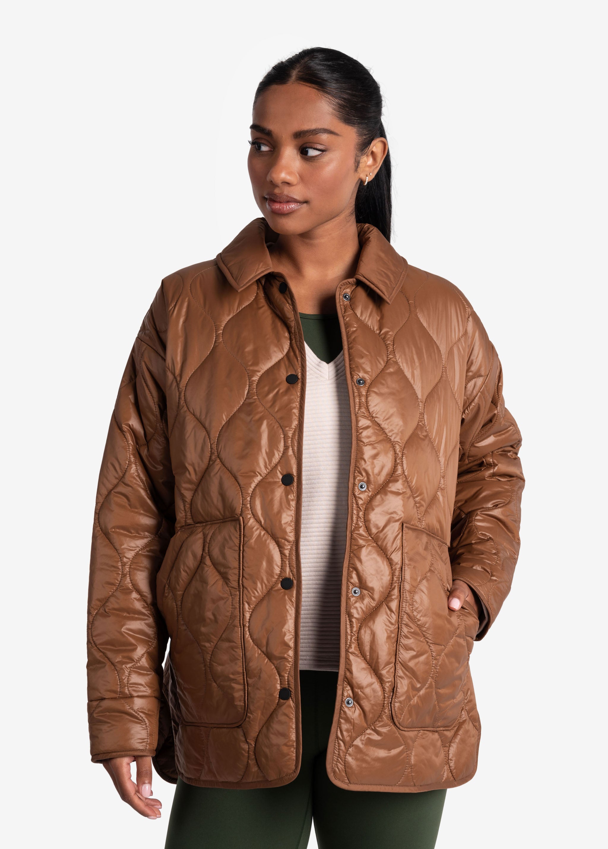 Lolë The Shacket Insulated Jacket in black — part shirt, part jacket, the Shacket is made for transitional days