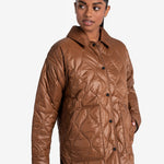 Lolë The Shacket Insulated Jacket in black — part shirt, part jacket, the Shacket is made for transitional days