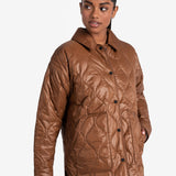 Lolë The Shacket Insulated Jacket in black — part shirt, part jacket, the Shacket is made for transitional days