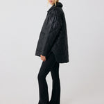 Lolë The Shacket Insulated Jacket in black — part shirt, part jacket, the Shacket is made for transitional days
