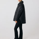Lolë The Shacket Insulated Jacket in black — part shirt, part jacket, the Shacket is made for transitional days