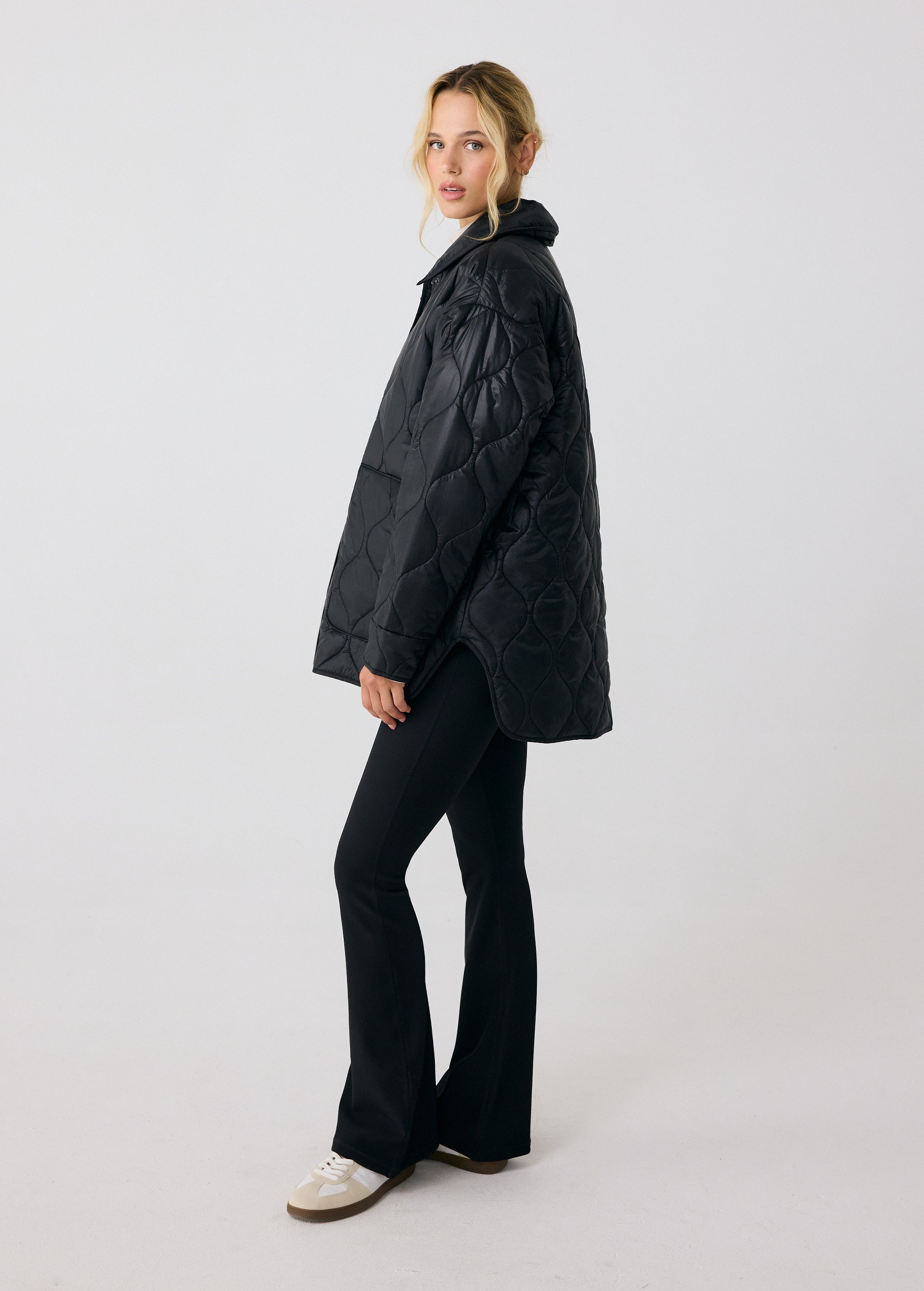 Lolë The Shacket Insulated Jacket in black — part shirt, part jacket, the Shacket is made for transitional days