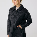 Lolë The Shacket Insulated Jacket in black — part shirt, part jacket, the Shacket is made for transitional days