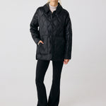 Lolë The Shacket Insulated Jacket in black — part shirt, part jacket, the Shacket is made for transitional days