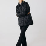 Lolë The Shacket Insulated Jacket in black — part shirt, part jacket, the Shacket is made for transitional days