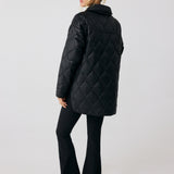 Lolë The Shacket Insulated Jacket in black — part shirt, part jacket, the Shacket is made for transitional days