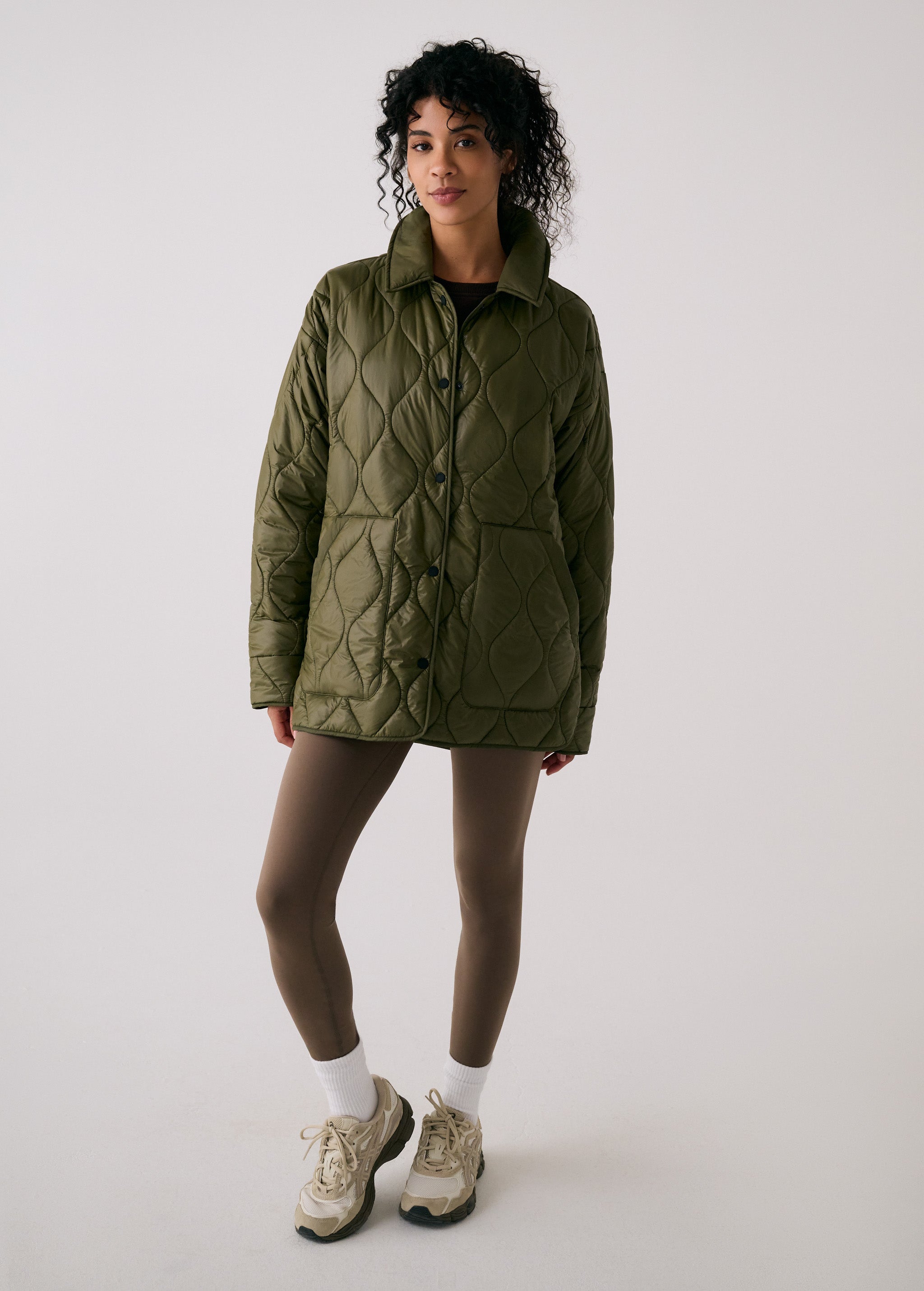 Lolë The Shacket Insulated Jacket in Moss olive green — part shirt, part jacket, the Shacket is made for transitional days
