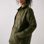 Lolë The Shacket Insulated Jacket in Moss olive green — part shirt, part jacket, the Shacket is made for transitional days