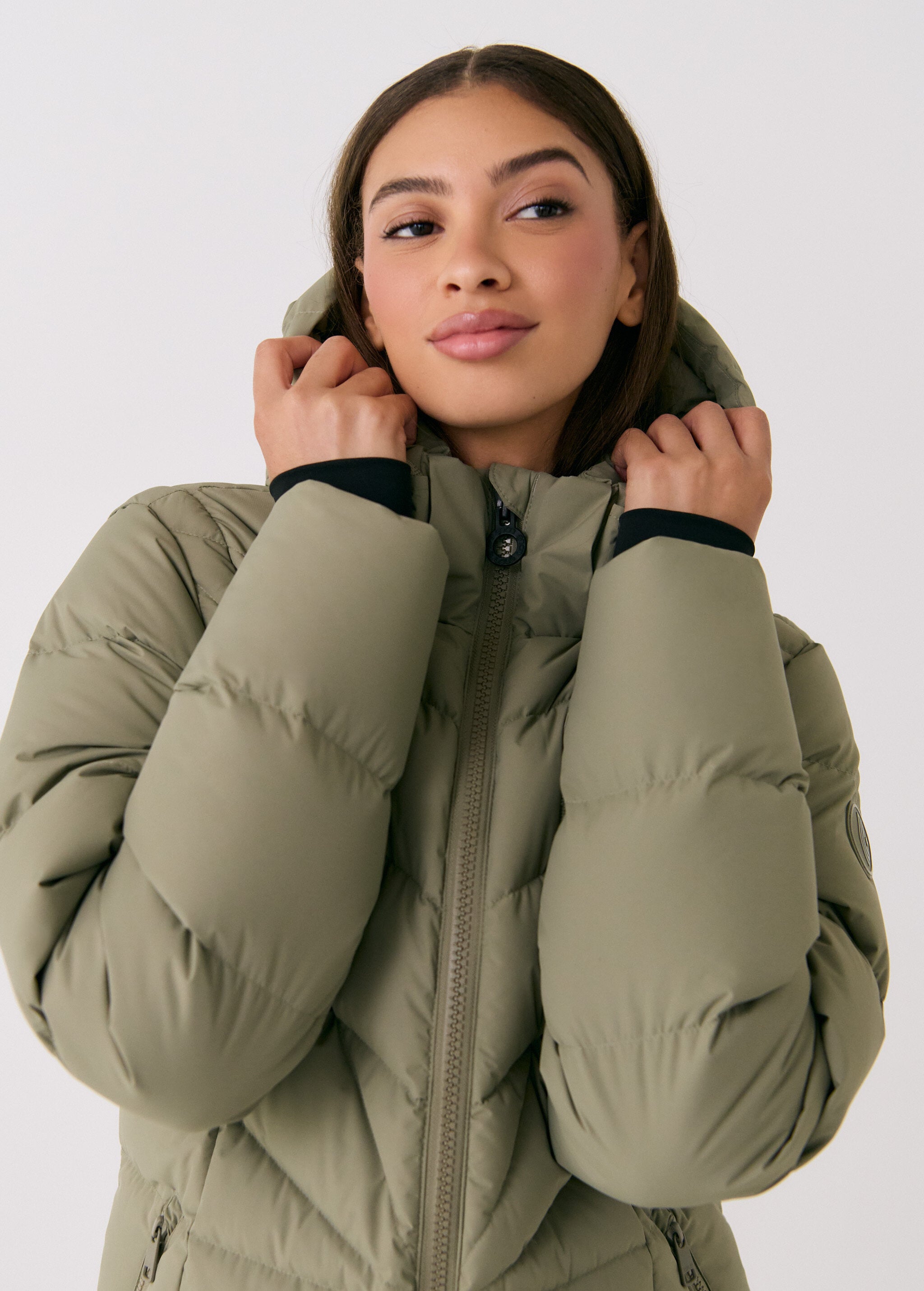Lolë Berri Down Jacket in Hazel sage green — the Berri down jacket is your cold weather wardrobe hero