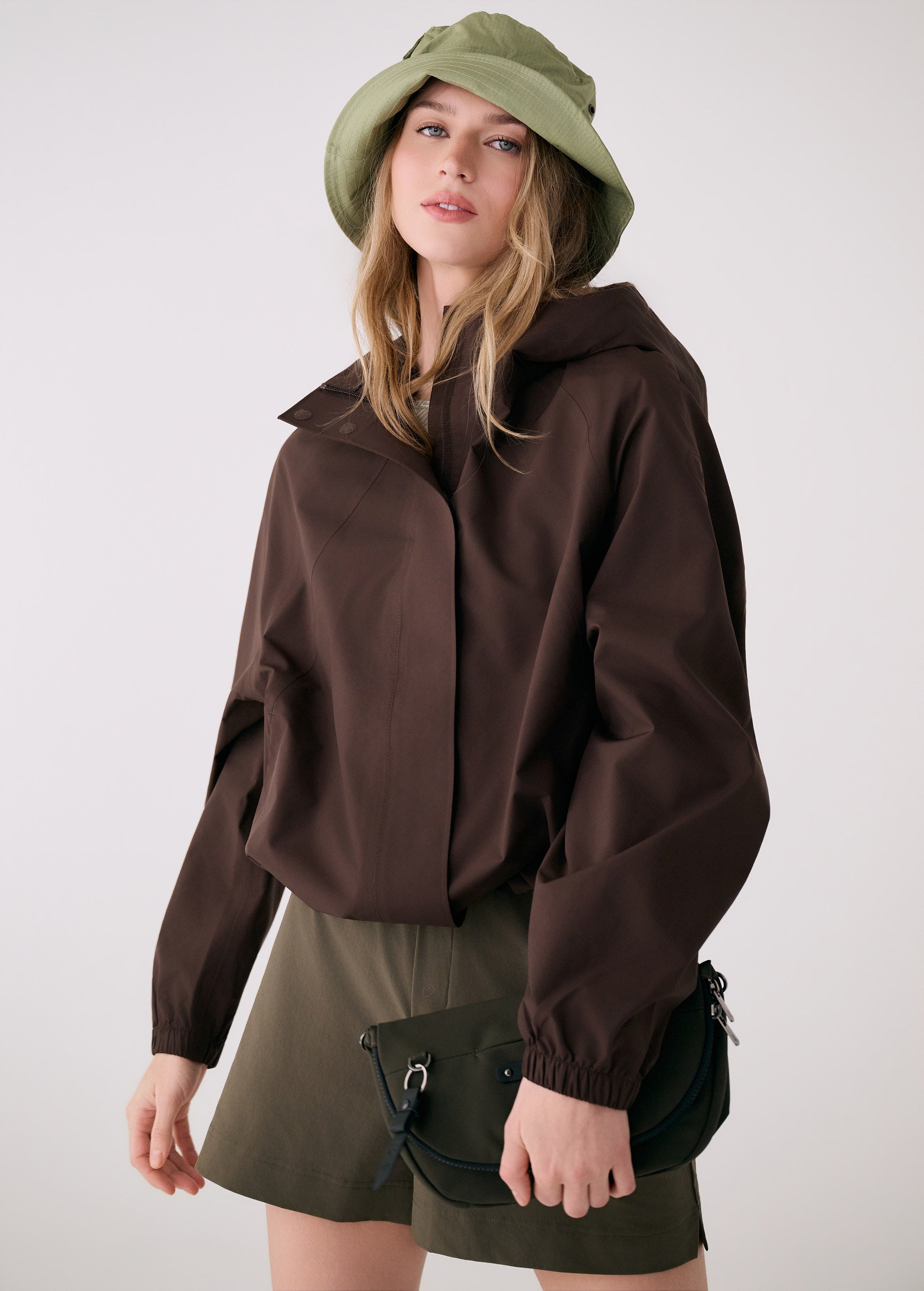 Lolë Alizé Rain Jacket in Java dark brown — fit note: Designed with a relaxed, oversized fit