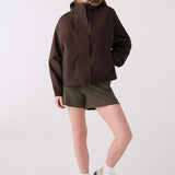 Lolë Alizé Rain Jacket in Java dark brown — fit note: Designed with a relaxed, oversized fit