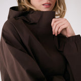 Lolë Alizé Rain Jacket in Java dark brown — fit note: Designed with a relaxed, oversized fit