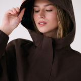 Lolë Alizé Rain Jacket in Java dark brown — fit note: Designed with a relaxed, oversized fit