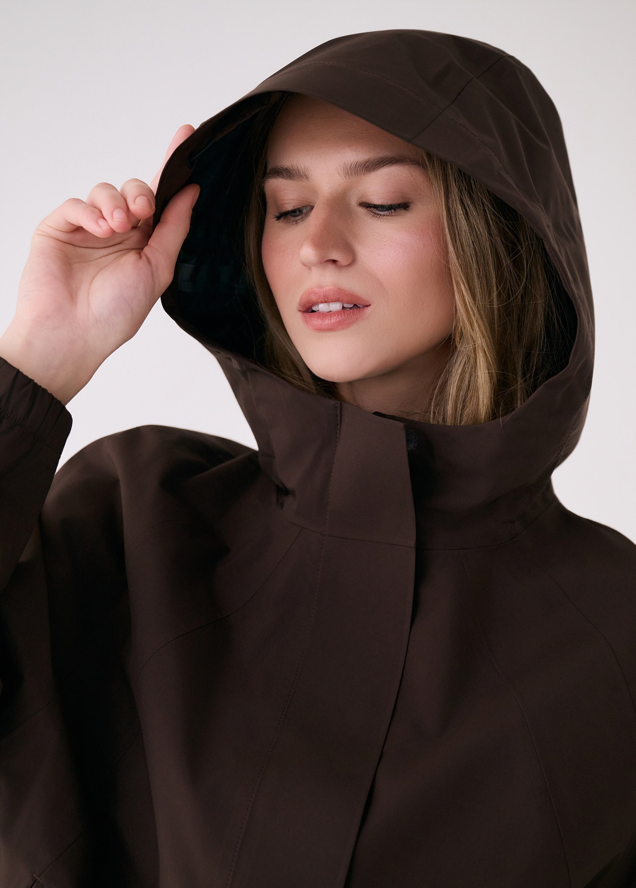 Lolë Alizé Rain Jacket in Java dark brown — fit note: Designed with a relaxed, oversized fit