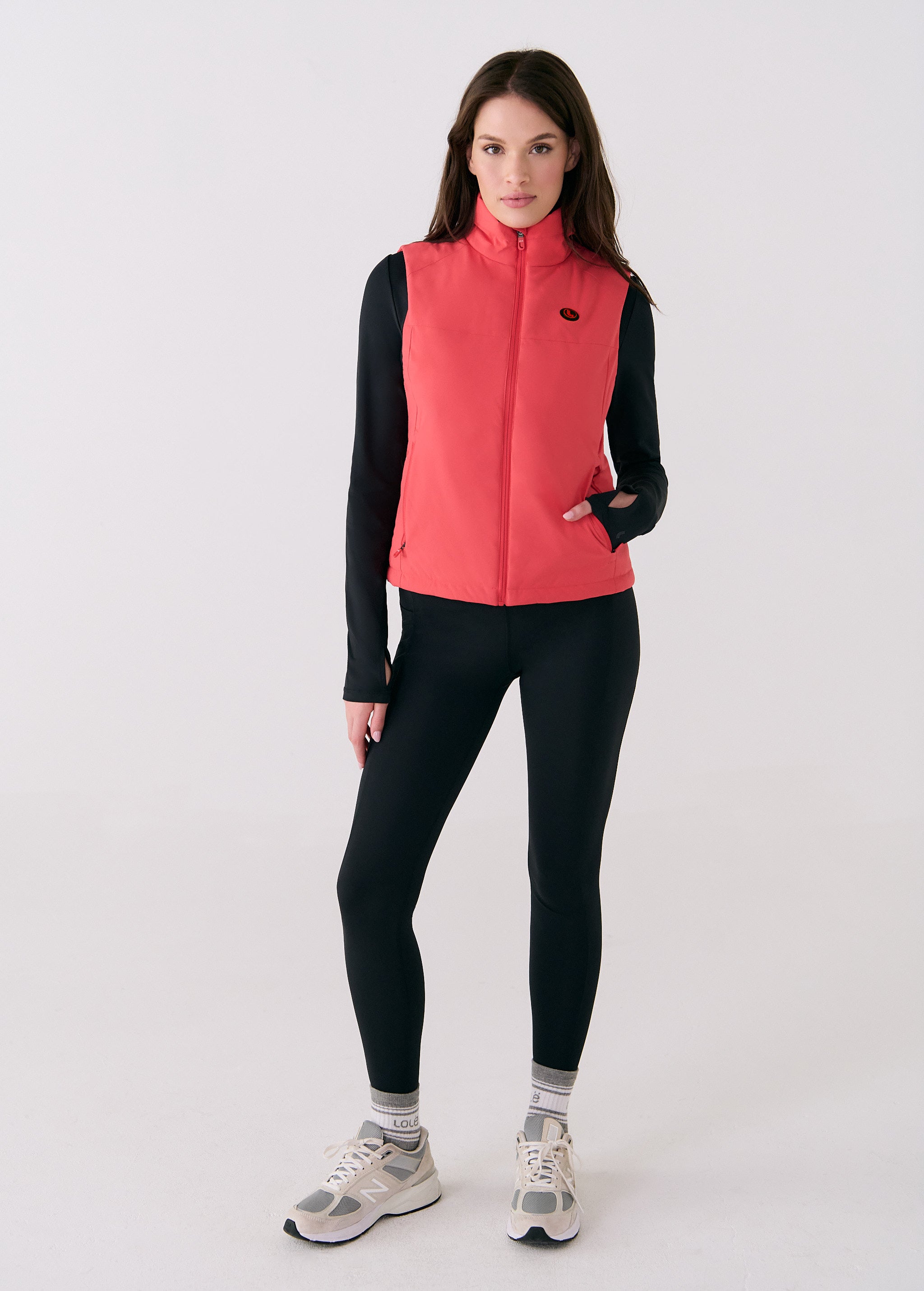 Lolë Heat It Up Heated Vest in Cayenne coral red