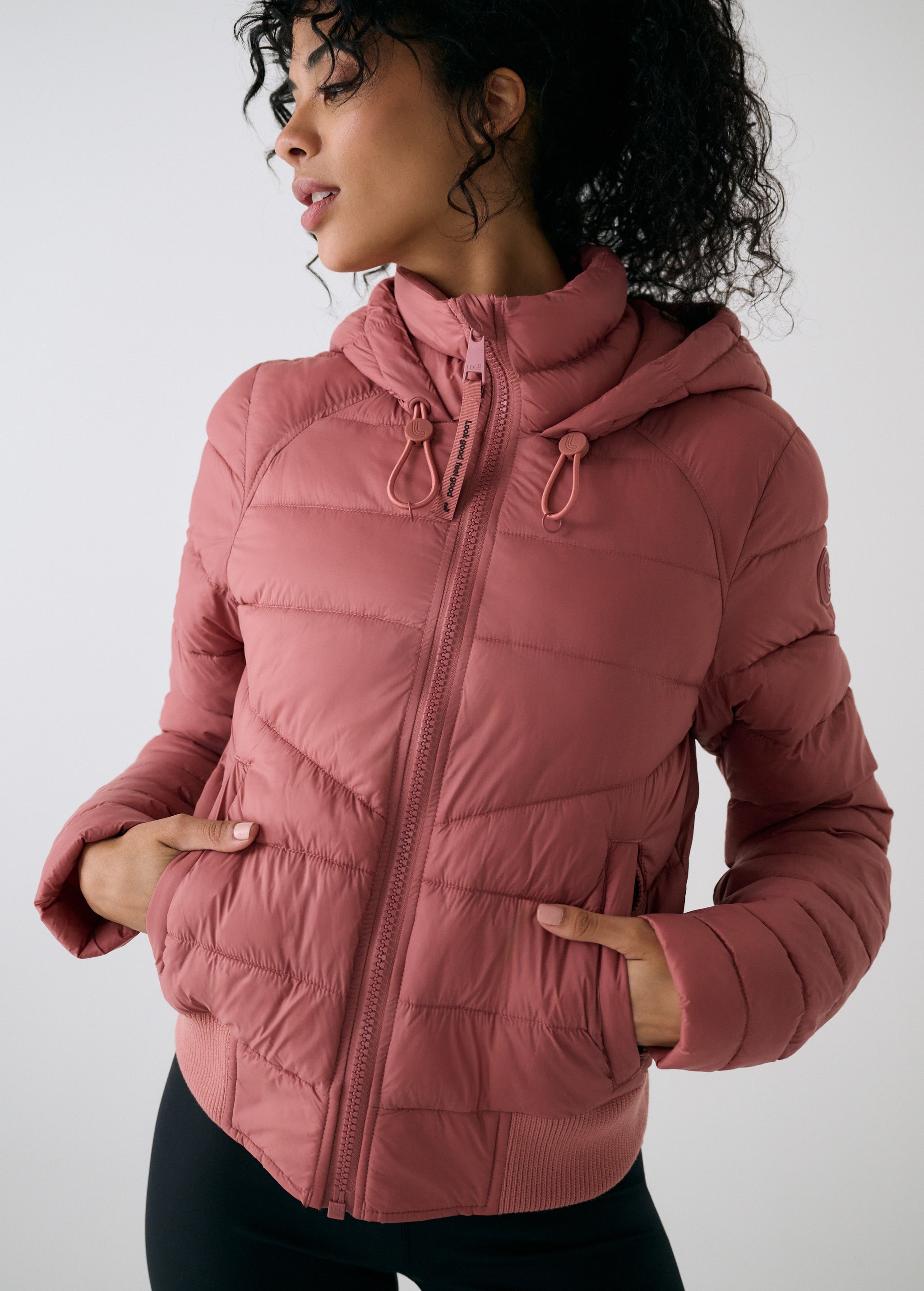 Lolë Eli Synth Down Bomber Jacket in rose — bonus points for the cropped fit and everyday-ready hues