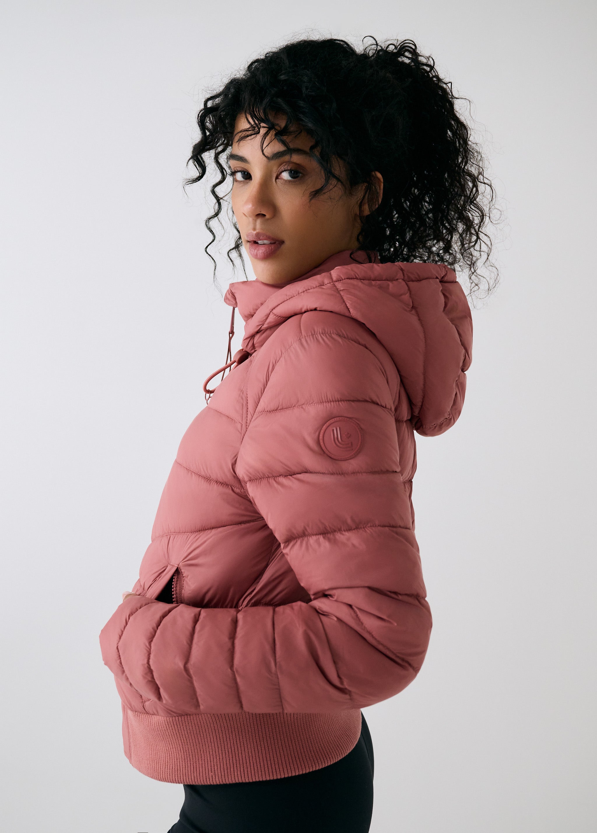 Lolë Eli Synth Down Bomber Jacket in rose — bonus points for the cropped fit and everyday-ready hues