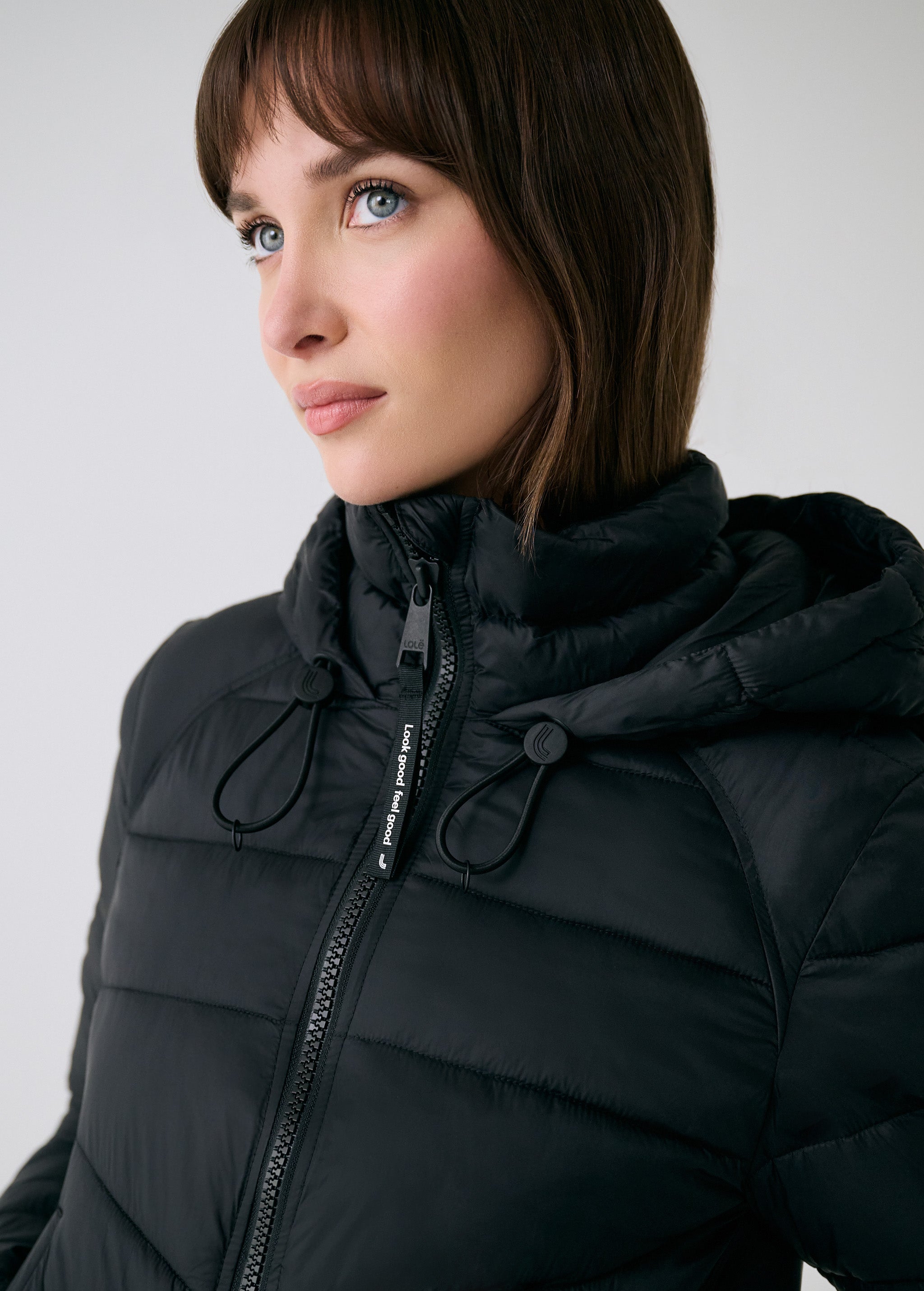 Lolë Eli Synth Down Bomber Jacket in black — bonus points for the cropped fit and everyday-ready hues