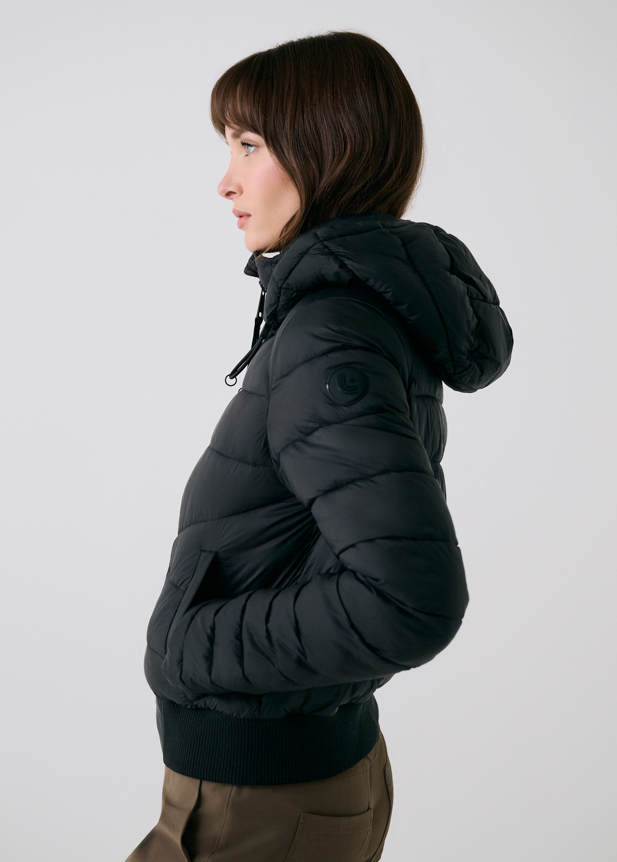 Lolë Eli Synth Down Bomber Jacket in black — bonus points for the cropped fit and everyday-ready hues
