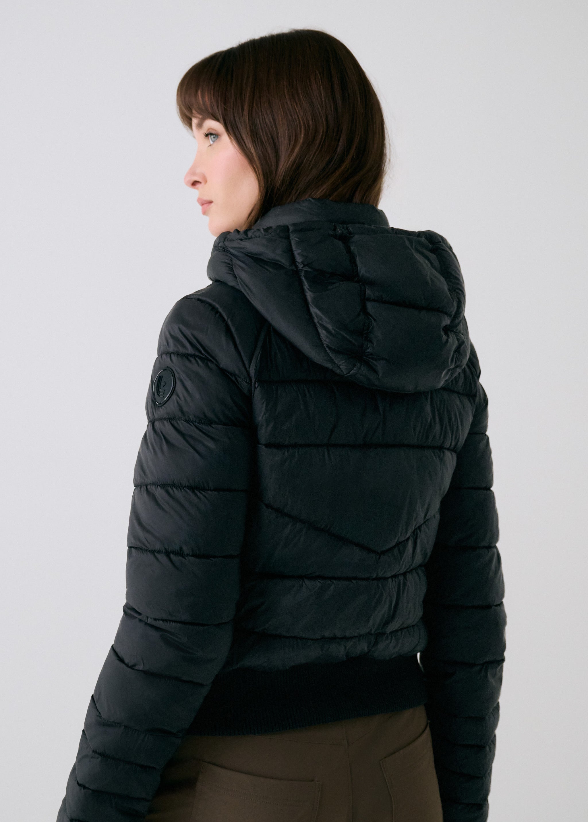 Lolë Eli Synth Down Bomber Jacket in black — bonus points for the cropped fit and everyday-ready hues