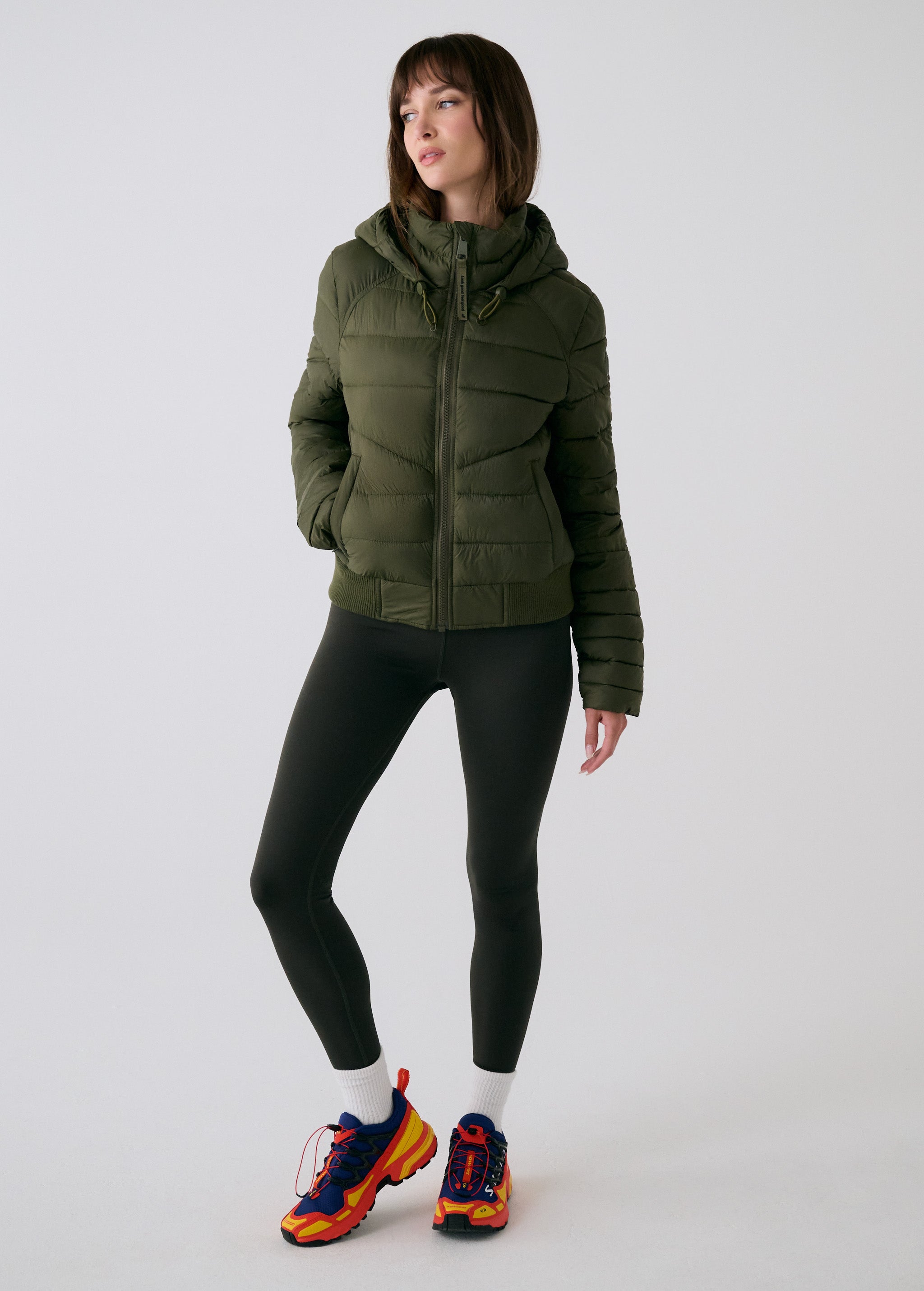 Lolë Eli Synth Down Bomber Jacket in Moss olive green — bonus points for the cropped fit and everyday-ready hues