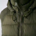 Lolë Eli Synth Down Bomber Jacket in Moss olive green — bonus points for the cropped fit and everyday-ready hues