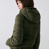 Lolë Eli Synth Down Bomber Jacket in Moss olive green — bonus points for the cropped fit and everyday-ready hues