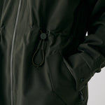 Lolë Piper 2.0 rain jacket in olive green, close view of the waist drawcord toggle and angled zip pocket