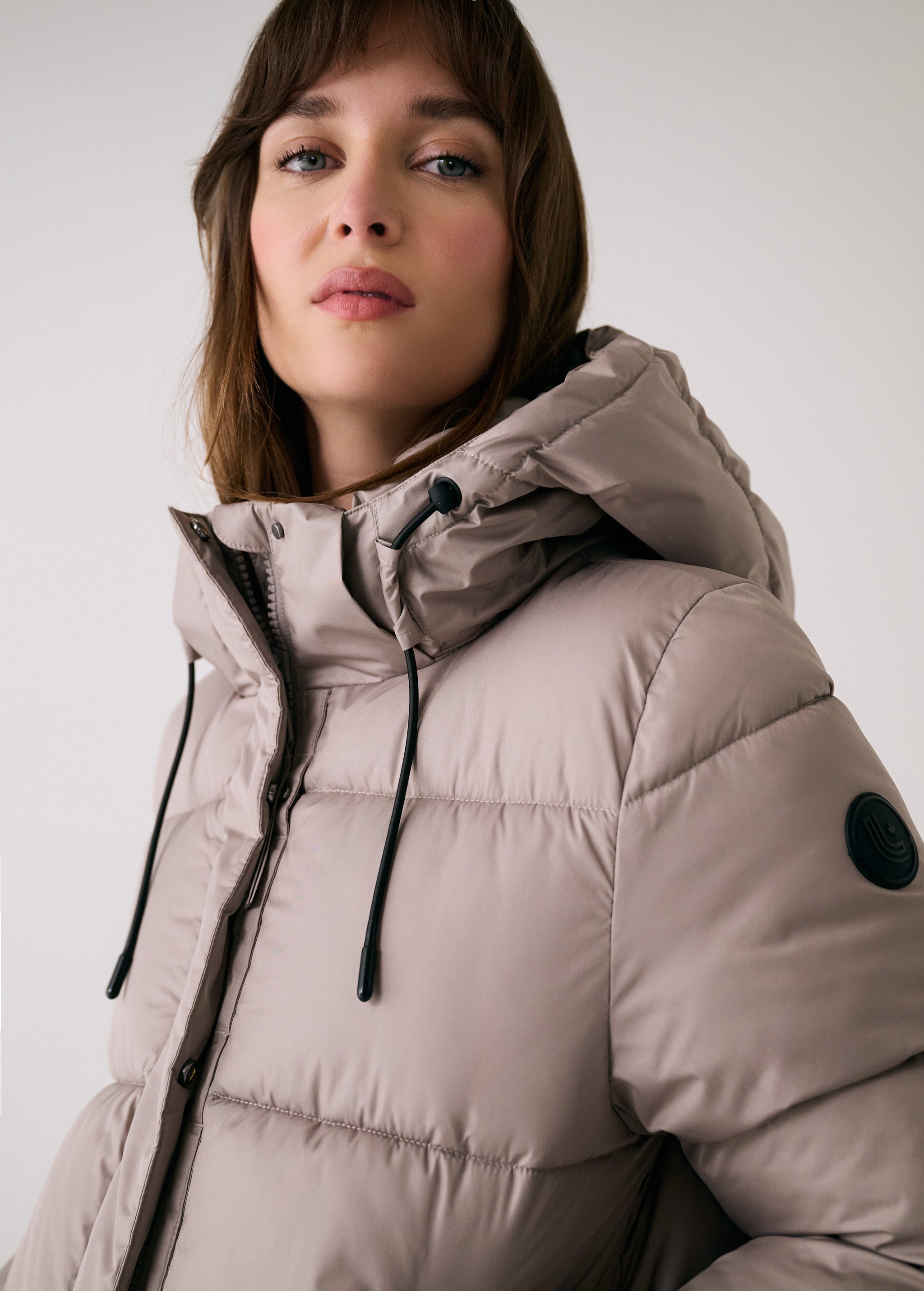 Lolë London Cropped Puffer in Pebble taupe — the London Cropped Puffer combines bold style with everyday function