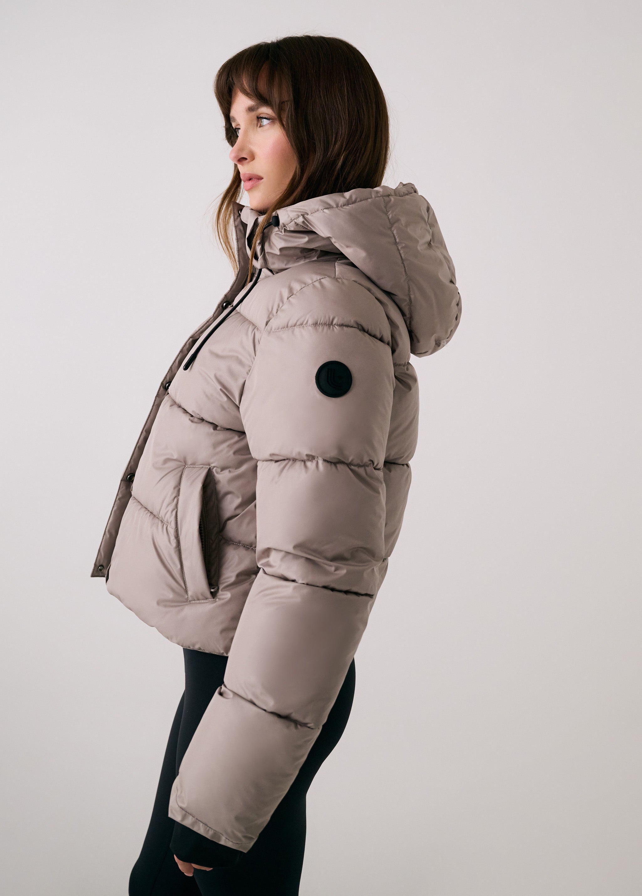 Lolë London Cropped Puffer in Pebble taupe — the London Cropped Puffer combines bold style with everyday function
