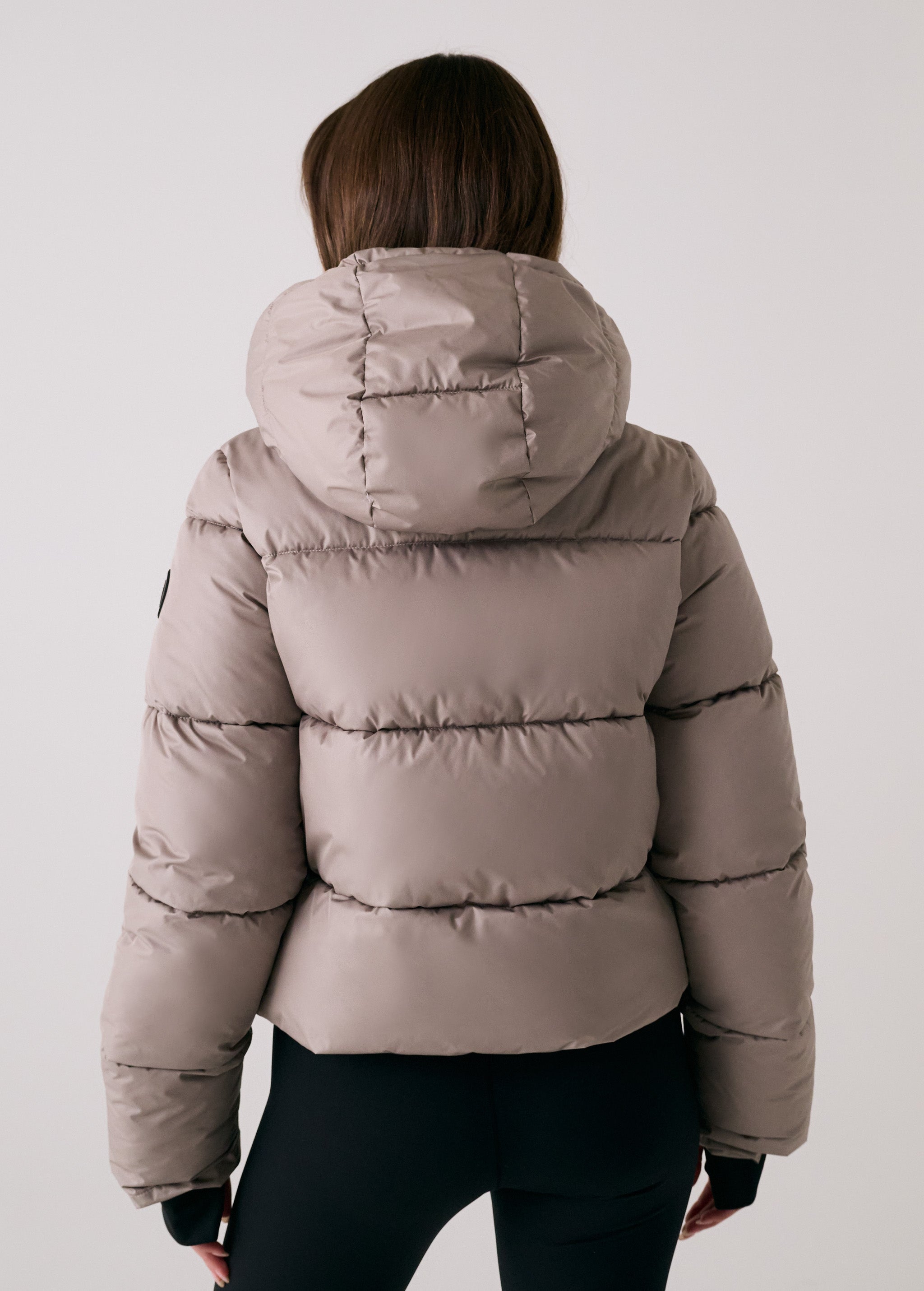 Lolë London Cropped Puffer in Pebble taupe — the London Cropped Puffer combines bold style with everyday function