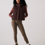 Lolë London Cropped Vest in Java dark brown — wear it over a hoodie or under a coat