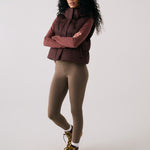 Lolë London Cropped Vest in Java dark brown — wear it over a hoodie or under a coat