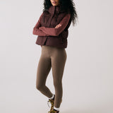 Lolë London Cropped Vest in Java dark brown — wear it over a hoodie or under a coat