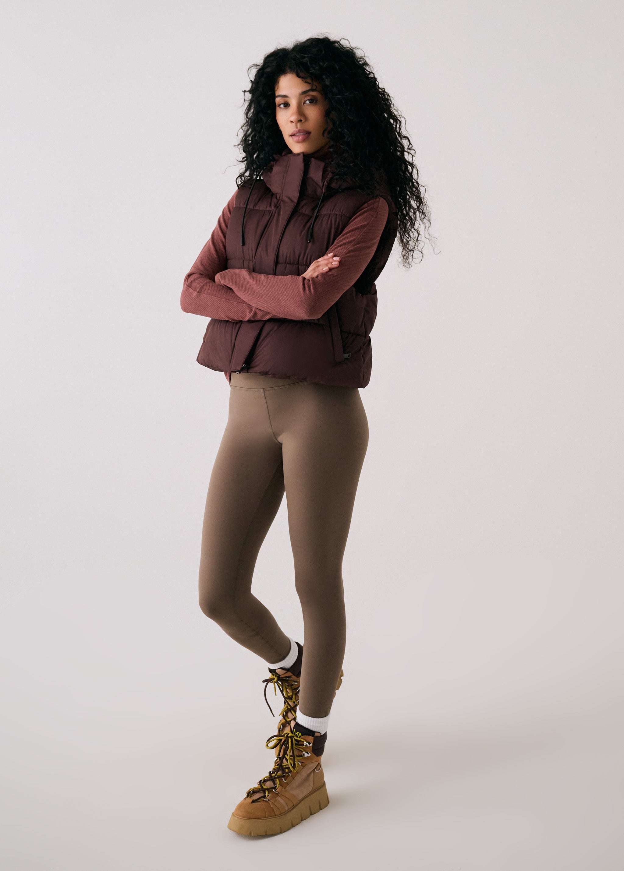 Lolë London Cropped Vest in Java dark brown — wear it over a hoodie or under a coat