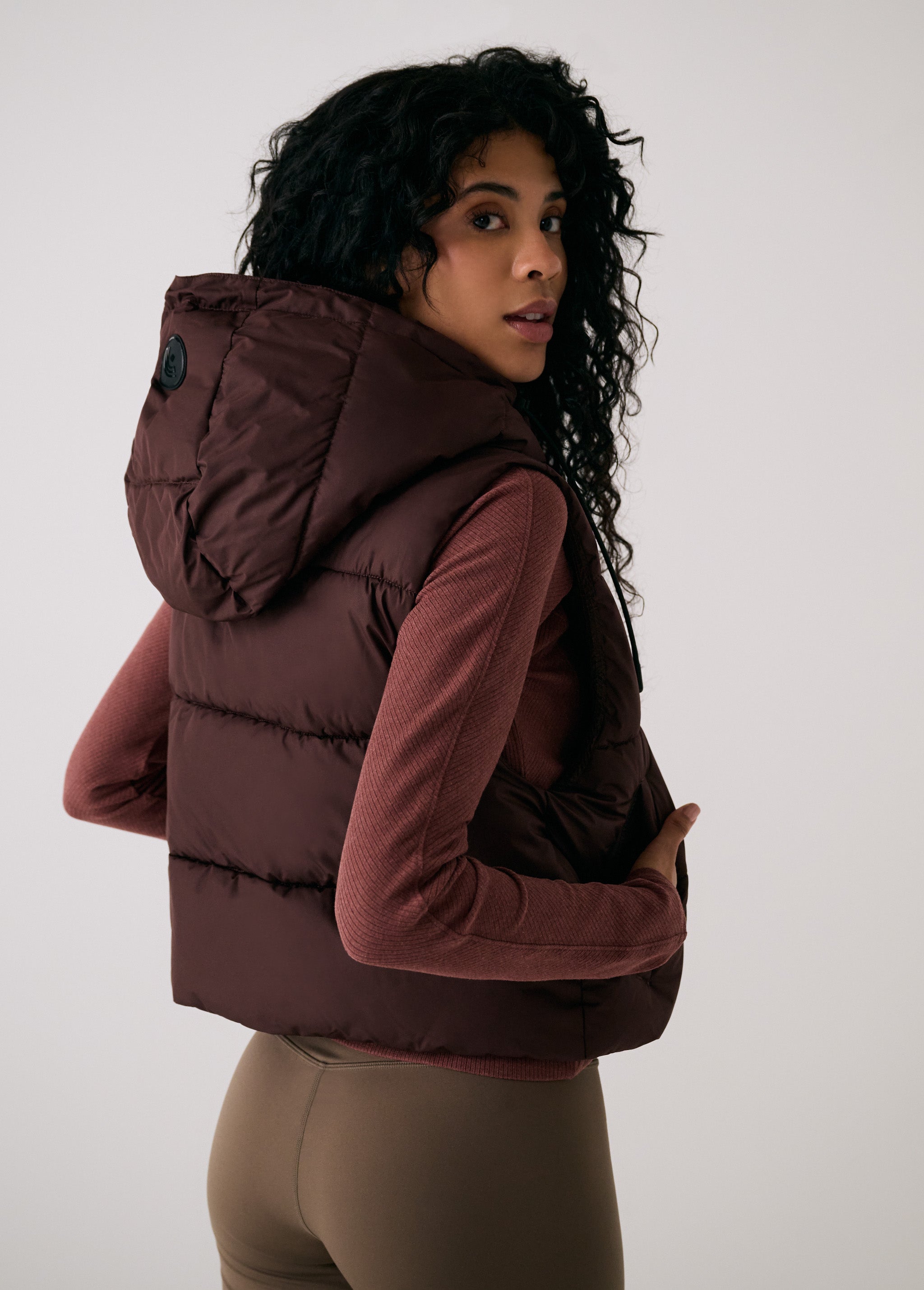 Lolë London Cropped Vest in Java dark brown — wear it over a hoodie or under a coat