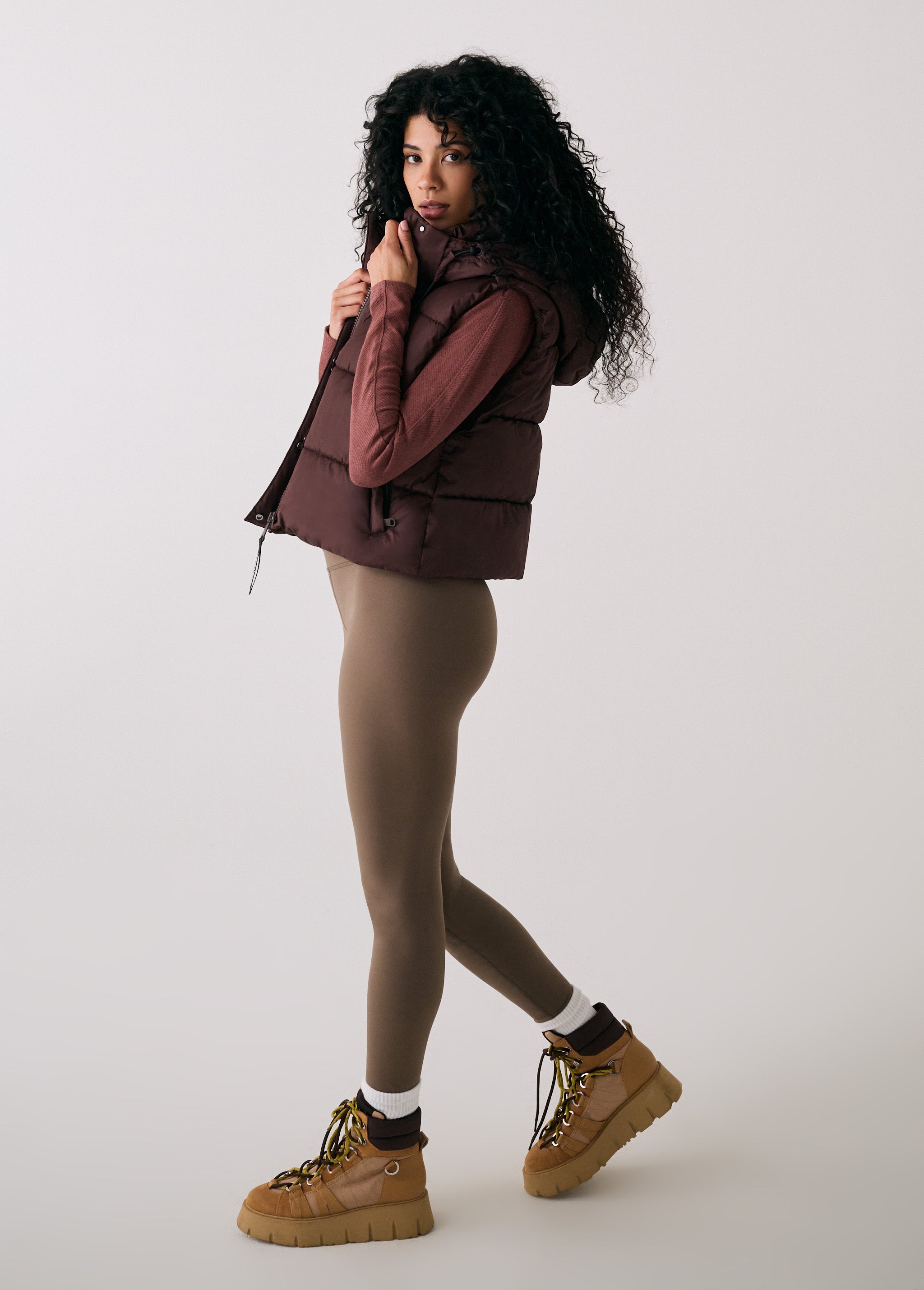 Lolë London Cropped Vest in Java dark brown — wear it over a hoodie or under a coat