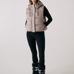 Lolë London Cropped Vest in Pebble taupe — wear it over a hoodie or under a coat
