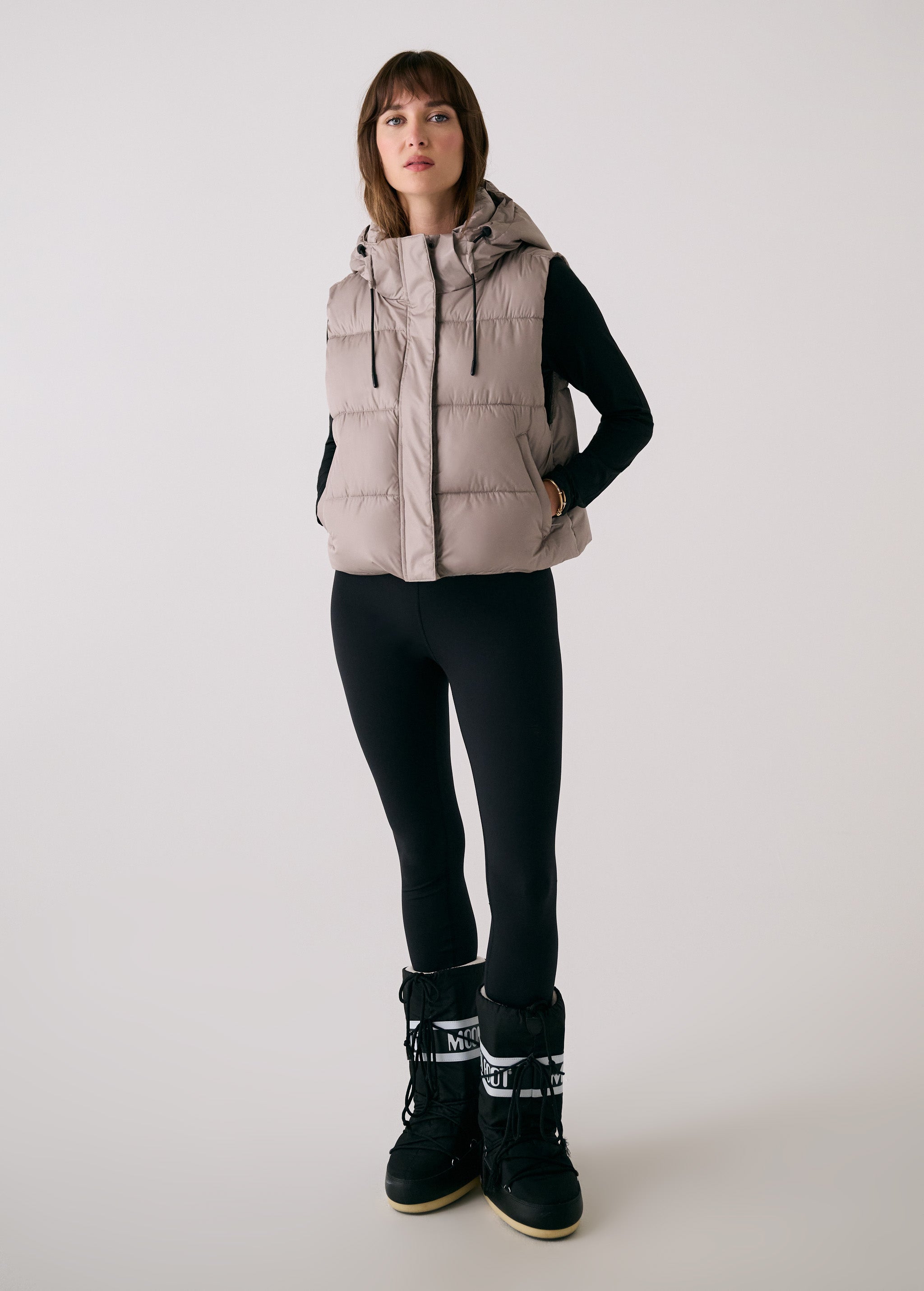 Lolë London Cropped Vest in Pebble taupe — wear it over a hoodie or under a coat