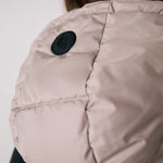 Lolë London Cropped Vest in Pebble taupe — wear it over a hoodie or under a coat