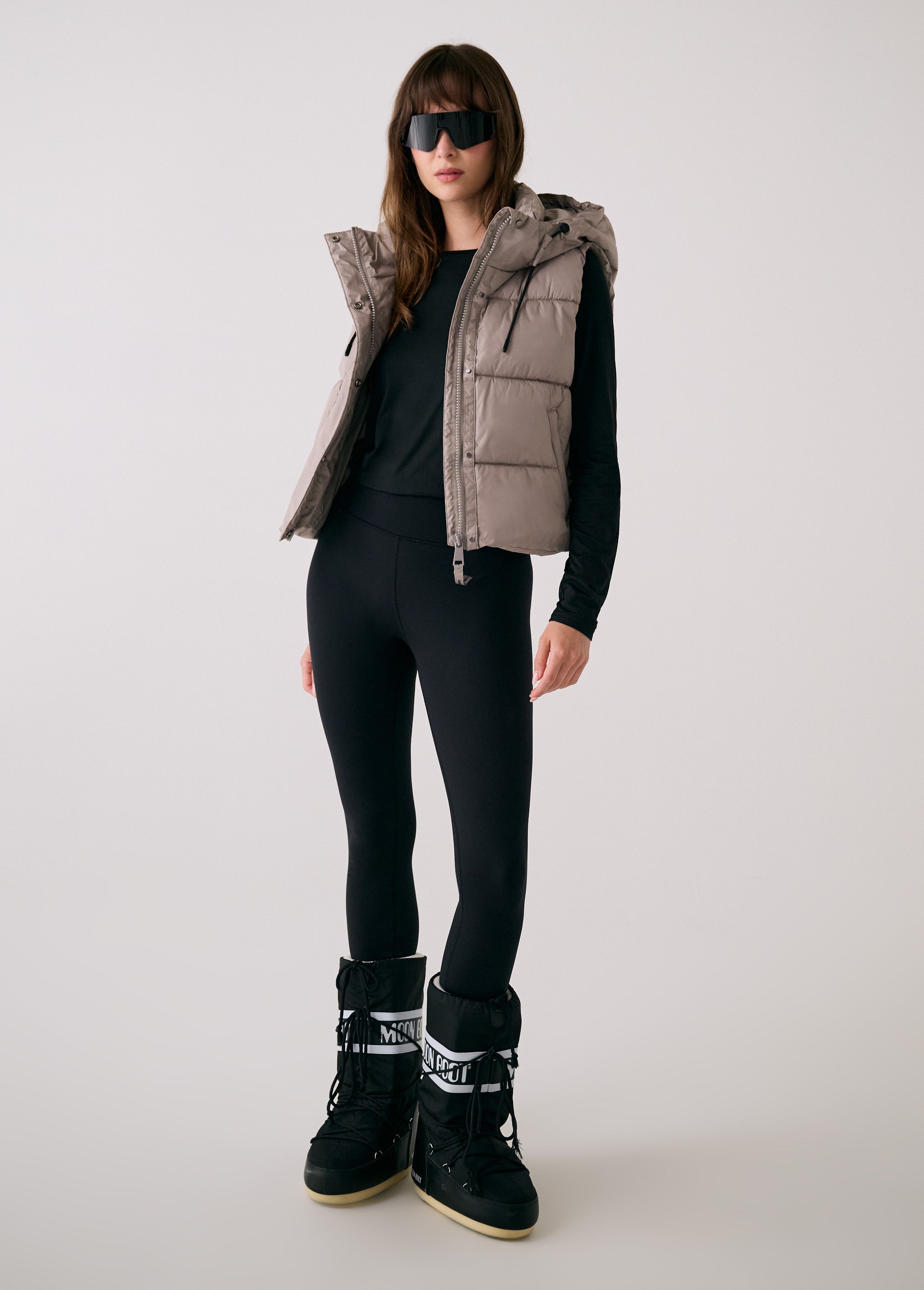 Lolë London Cropped Vest in Pebble taupe — wear it over a hoodie or under a coat