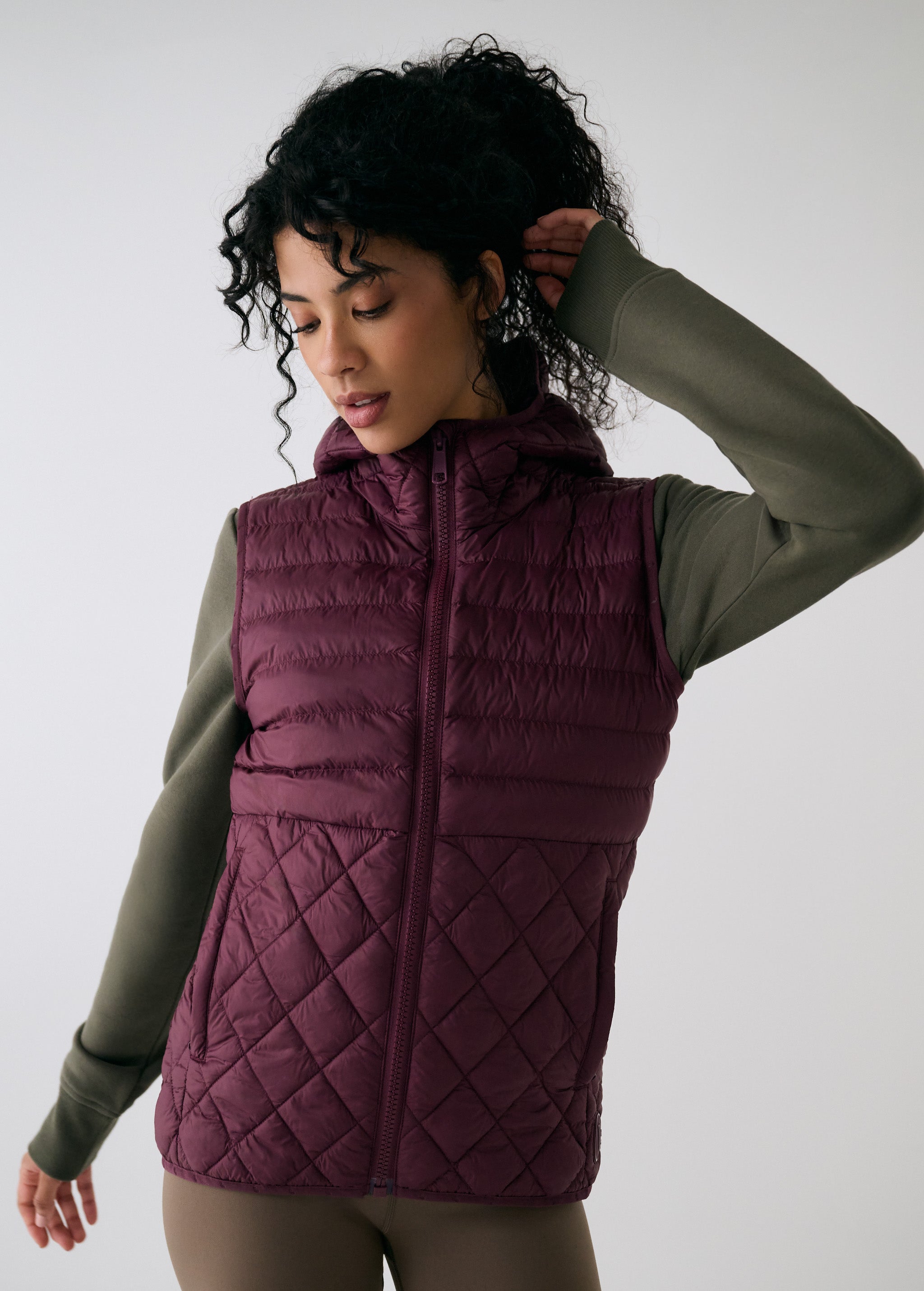 Lolë The Base Insulated Packable Vest in burgundy