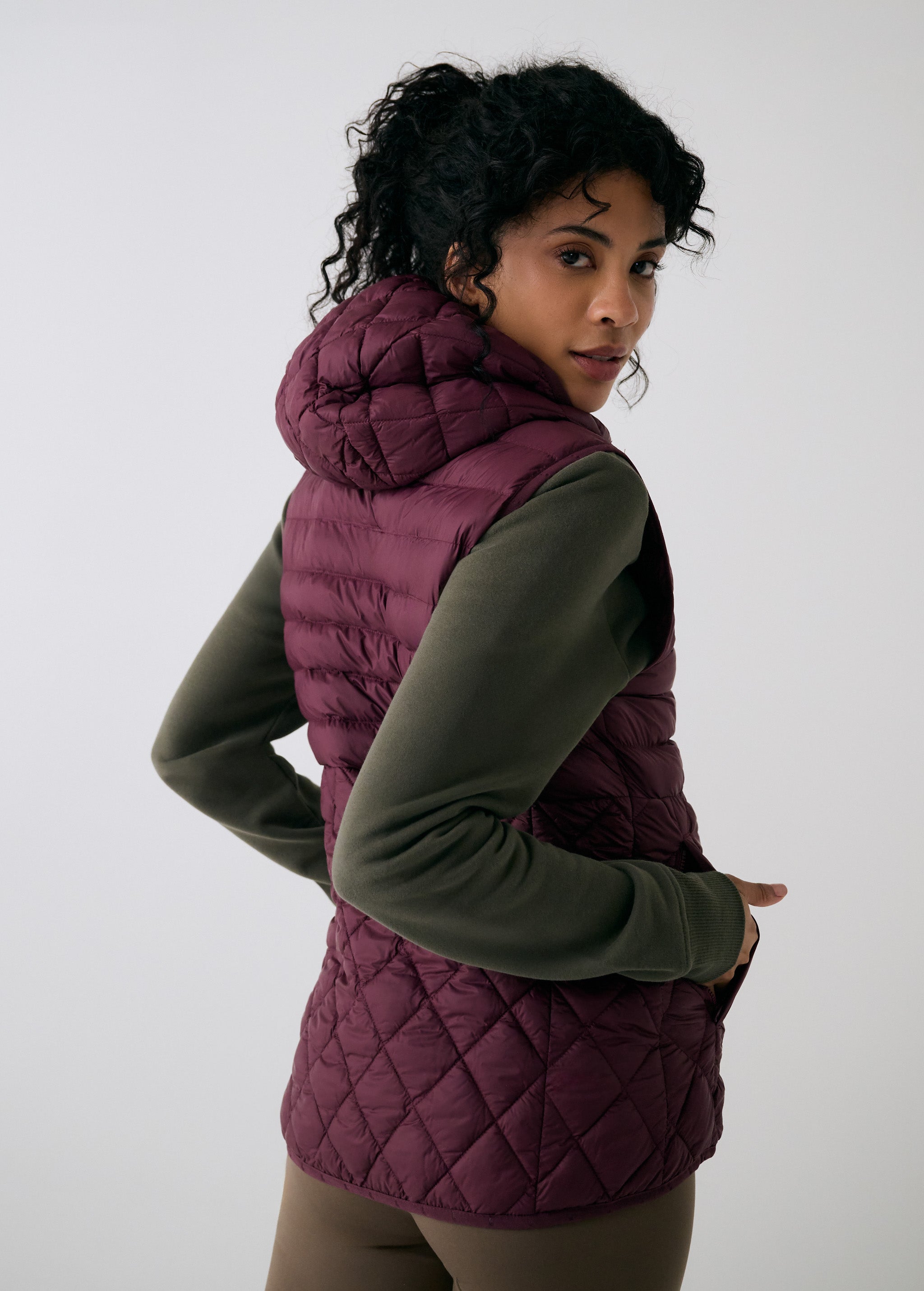 Lolë The Base Insulated Packable Vest in burgundy