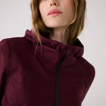 Lolë Element 2 Rain Jacket in burgundy — the Element 2 Rain Jacket is fully seam-sealed to keep moisture out