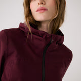 Lolë Element 2 Rain Jacket in burgundy — the Element 2 Rain Jacket is fully seam-sealed to keep moisture out